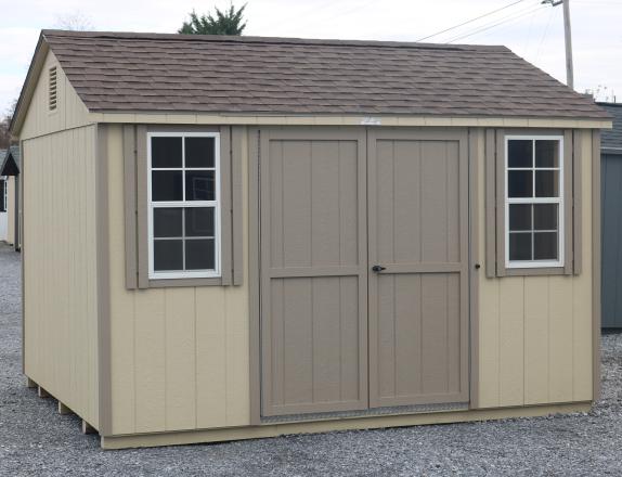 Pine Creek 10x12 HD Peak with Beige walls, PC Clay trim and PC Clay shutters, and Barkwood shingles